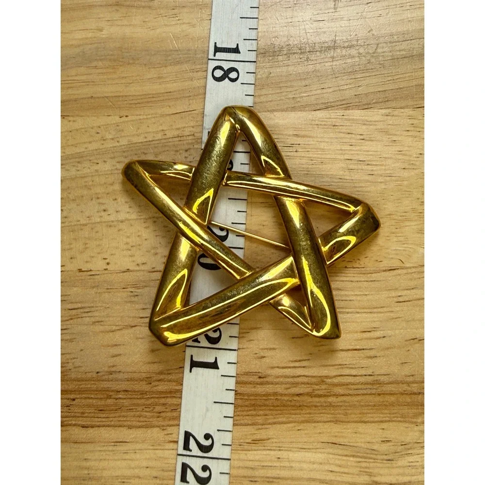 Yves Saint Laurent type brooch